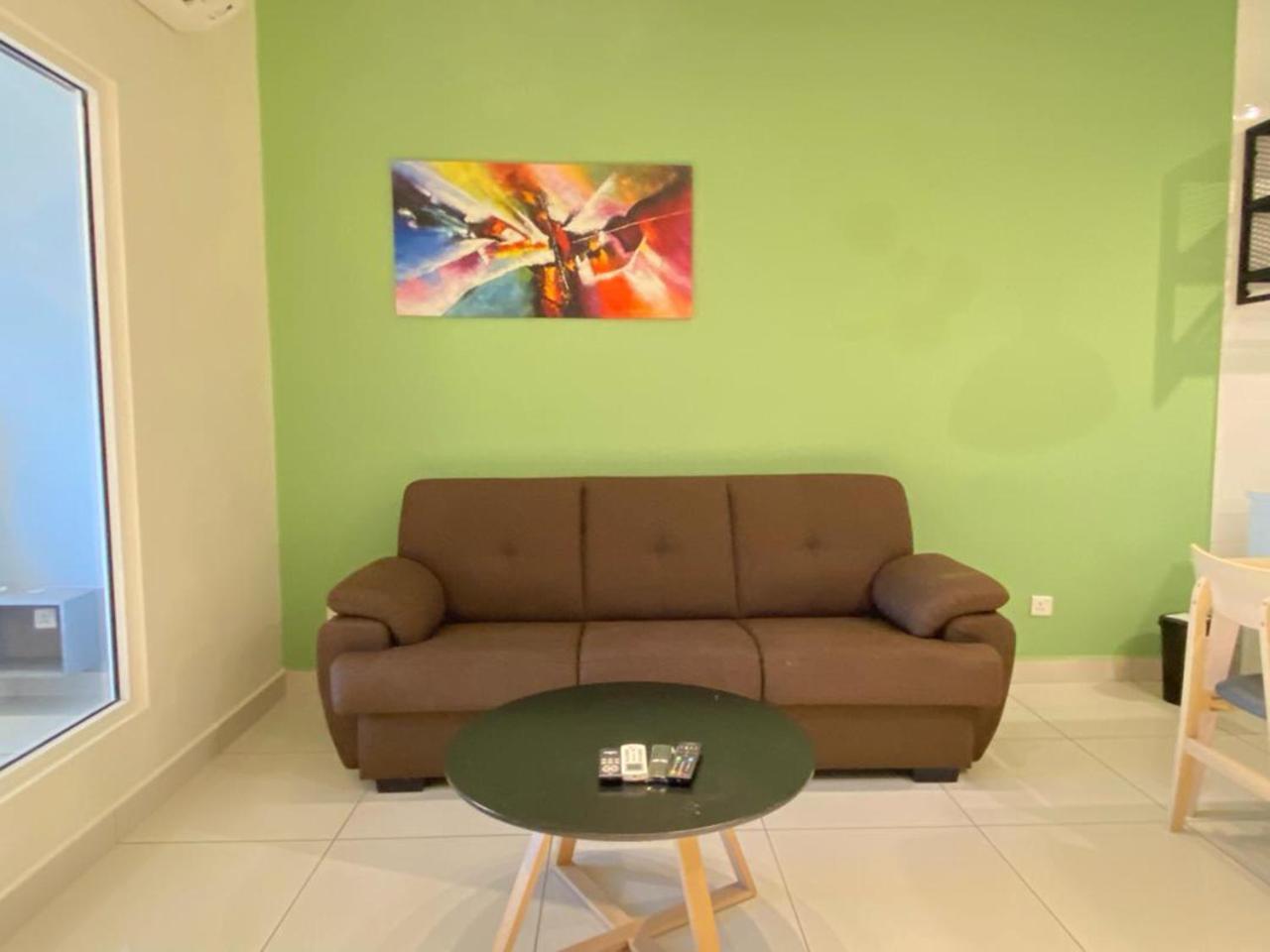 Arte Mont Kiara Aparthotel Kuala Lumpur Exterior photo A living room with a sofa